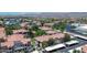 A neighborhood features apartments and covered parking under blue skies and against a mountain backdrop at 3830 E Lakewood E Pkwy # 2126, Phoenix, AZ 85048