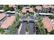 Aerial view of a condo community highlighting the landscaping and entrance gate to the property at 3830 E Lakewood E Pkwy # 2126, Phoenix, AZ 85048