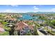 Breathtaking aerial view of a waterfront community with stunning lake, mountain, and city vistas at 3830 E Lakewood E Pkwy # 2126, Phoenix, AZ 85048