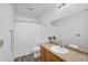 Clean bathroom featuring a functional vanity with a sink and mirror, complemented by a shower and toilet at 3830 E Lakewood E Pkwy # 2126, Phoenix, AZ 85048