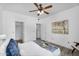 Spacious bedroom featuring a comfortable bed, soft lighting, and a decorative painting, with ample space at 3830 E Lakewood E Pkwy # 2126, Phoenix, AZ 85048