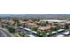 Scenic aerial view of a sprawling residential community with mature trees and convenient covered parking at 3830 E Lakewood E Pkwy # 2126, Phoenix, AZ 85048