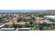 Expansive aerial view of a residential community boasting lush greenery, mature trees, and covered parking at 3830 E Lakewood E Pkwy # 2126, Phoenix, AZ 85048