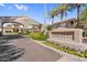 Stone sign welcomes you to Portofino Condominiums with lush landscaping at 3830 E Lakewood E Pkwy # 2126, Phoenix, AZ 85048