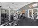 Community fitness center with modern exercise equipment and rubber floor at 3830 E Lakewood E Pkwy # 2126, Phoenix, AZ 85048