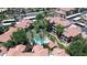 Overhead view of residential apartments with a communal pool, greenery, and manicured walking path at 3830 E Lakewood E Pkwy # 2126, Phoenix, AZ 85048