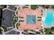 Aerial view of building featuring a unique tile roof with a courtyard and adjacent pool area at 3830 E Lakewood E Pkwy # 2126, Phoenix, AZ 85048