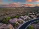 Gorgeous aerial view of desert homes with mountain views, lush desert landscape, and serene atmosphere at 40123 N Majesty Trl, Anthem, AZ 85086