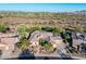 Stunning aerial view of a home with desert landscaping, private pool, and tile roof in a lush community at 40123 N Majesty Trl, Anthem, AZ 85086