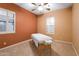 A versatile space with plantation shutters and neutral paint, ideal as a bedroom or treatment room at 40123 N Majesty Trl, Anthem, AZ 85086
