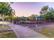 Community playground with shade covers and crosswalk at 40123 N Majesty Trl, Anthem, AZ 85086