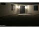 Outdoor patio with modern lighting featuring sliding glass door and rock landscaping at 4079 E Roosevelt St, Apache Junction, AZ 85119