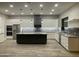 Gourmet kitchen with stainless steel appliances, granite countertops, and a large island at 4079 E Roosevelt St, Apache Junction, AZ 85119