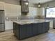 Beautiful kitchen with a large kitchen island with granite counters at 4079 E Roosevelt St, Apache Junction, AZ 85119