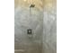 Modern shower with elegant tile, rainfall showerhead, and sleek fixtures at 4079 E Roosevelt St, Apache Junction, AZ 85119