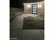 Concrete walkway leading to front door with modern lighting and desert landscaping at 4079 E Roosevelt St, Apache Junction, AZ 85119