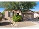 Charming single-story home with a well-manicured xeriscaped front yard and inviting curb appeal at 4245 E Ficus Way, Gilbert, AZ 85298