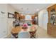 Bright eat-in kitchen with granite countertops, stainless steel appliances, and ample cabinet space at 4245 E Ficus Way, Gilbert, AZ 85298