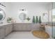 Spacious bathroom features double sinks, a standalone tub, and separate shower, for a relaxing experience at 4266 E Blue Sage Ct, Gilbert, AZ 85297