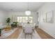 Open dining room with hardwood floors and modern decor, perfect for entertaining friends and Gathering at 4266 E Blue Sage Ct, Gilbert, AZ 85297