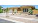 Attractive single-story home featuring a three-car garage and low-maintenance desert landscaping at 4266 E Blue Sage Ct, Gilbert, AZ 85297