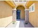 Inviting front entrance with stone accents and a decorative arched doorway at 4266 E Blue Sage Ct, Gilbert, AZ 85297