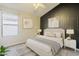 Modern bedroom design features a stylish accent wall, neutral decor, and ambient lighting at 43727 W Wade Dr, Maricopa, AZ 85138