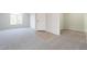 Expansive living room area has lots of space with high ceilings and neutral paint at 43727 W Wade Dr, Maricopa, AZ 85138