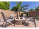 Cozy backyard fire pit area with seating, providing a relaxing outdoor gathering space at 45539 W Long Way, Maricopa, AZ 85139
