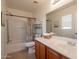 Functional bathroom with a shower-tub combo, vanity with storage, and neutral finishes at 4642 E Sierrita Rd, San Tan Valley, AZ 85143