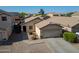 Lovely single-story home with a two-car garage, desert landscaping, and a welcoming entryway at 4642 E Sierrita Rd, San Tan Valley, AZ 85143