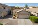 Charming single-story home with a two-car garage, desert landscaping, and inviting curb appeal at 4642 E Sierrita Rd, San Tan Valley, AZ 85143