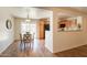 Bright kitchen and dining area with a pass-through window for easy serving and conversation at 4642 E Sierrita Rd, San Tan Valley, AZ 85143