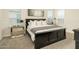 Comfortable main bedroom showcases a dark-colored wood bed frame and two mirrored nightstands at 5109 E Helena Dr, Scottsdale, AZ 85254