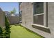 Backyard putting green features artificial turf for easy maintenance, perfect for golf enthusiasts at 5109 E Helena Dr, Scottsdale, AZ 85254