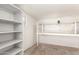 Basement with painted shelves and workspace, ideal for storage or hobbies at 5243 W Vernon Ave, Phoenix, AZ 85035