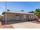 Single-story home featuring a covered carport and desert landscaping at 5243 W Vernon Ave, Phoenix, AZ 85035
