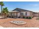 Single-story home boasts desert landscaping, a covered porch, and ample curb appeal at 5243 W Vernon Ave, Phoenix, AZ 85035