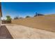 Large backyard with a tall brick wall, offering lots of privacy at 6430 W Thomas Rd, Phoenix, AZ 85033