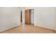 Bedroom featuring tile flooring, a closet and natural light at 6430 W Thomas Rd, Phoenix, AZ 85033