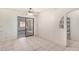 Dining area with tiled floor and sliding glass door to patio at 6430 W Thomas Rd, Phoenix, AZ 85033