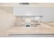Kitchen area with breakfast bar at 6430 W Thomas Rd, Phoenix, AZ 85033