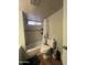 Bathroom featuring a shower, a toilet, and mosaic style tiles at 6439 W Myrtle Ave # 49, Glendale, AZ 85301