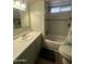 Cozy bathroom featuring a tub and shower combination and vanity with a mirror at 6439 W Myrtle Ave # 49, Glendale, AZ 85301