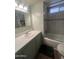 Bathroom featuring a shower, a toilet, a sink, and vanity at 6439 W Myrtle Ave # 49, Glendale, AZ 85301