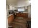 Kitchen featuring stainless steel appliances and wooden cabinetry at 6439 W Myrtle Ave # 49, Glendale, AZ 85301