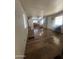 View of the living room featuring wood flooring that leads to the kitchen at 6439 W Myrtle Ave # 49, Glendale, AZ 85301
