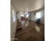 Open living space with hardwood floors throughout main living and dining areas at 6439 W Myrtle Ave # 49, Glendale, AZ 85301
