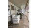 Enclosed patio area with washer and dryer hookups and plenty of extra storage at 6439 W Myrtle Ave # 49, Glendale, AZ 85301