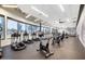 Bright fitness center with modern equipment, including treadmills and stationary bikes, in a community recreational space at 7222 E Gainey Ranch Rd # 245, Scottsdale, AZ 85258